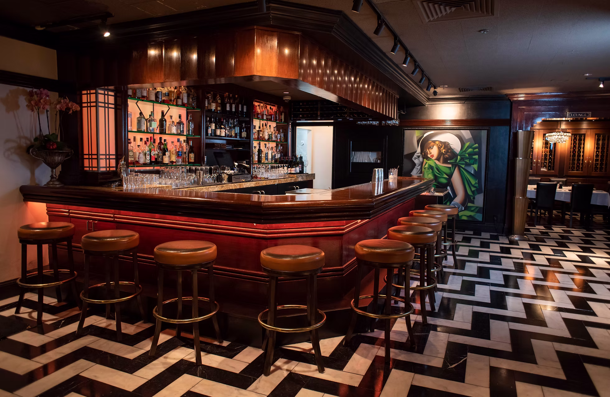 The Osso bar — chevron floor, wood, cocktail art
